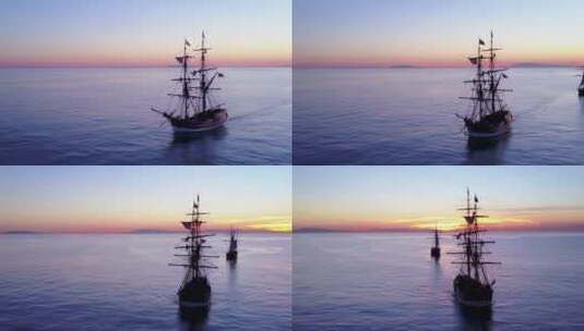 日落时分一艘高大帆船在海洋上航行高清在线视频素材下载