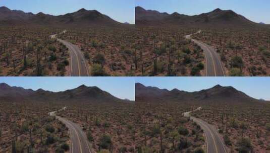 航拍沙漠公路上的摩托车高清在线视频素材下载