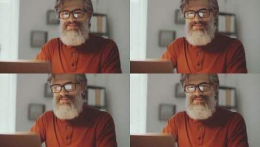 白胡子男人工作完摘下眼镜特写高清在线视频素材下载