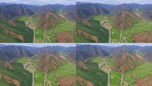 中国西部青藏高原甘肃省武威市山谷中的公路高清在线视频素材下载