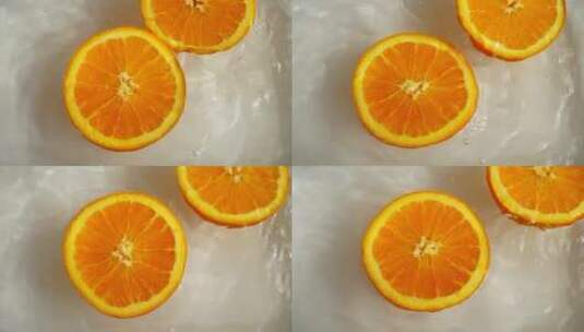漂浮在水中的橙色半旋转高清在线视频素材下载