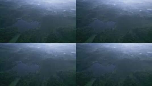 南方绿色乡村鱼塘水库雾气阳光唯美风景航拍高清在线视频素材下载