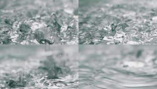 水滴落入水面激起浪花高清在线视频素材下载