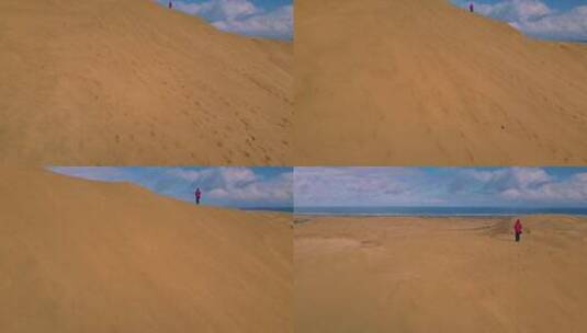 海边沙丘上的人高清在线视频素材下载