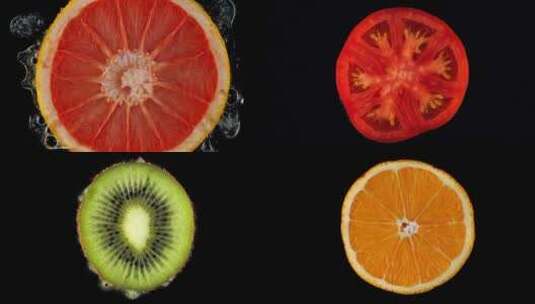 果汁鲜榨水果柚子橙子西红柿猕猴桃水果爆裂高清在线视频素材下载