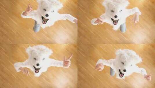 戴着白狼或狗面具跳舞的男孩的俯视图高清在线视频素材下载