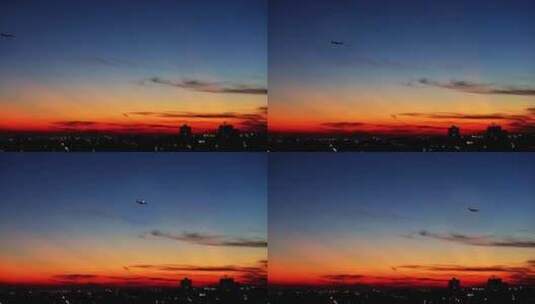 傍晚飞机飞过城市上空高清在线视频素材下载