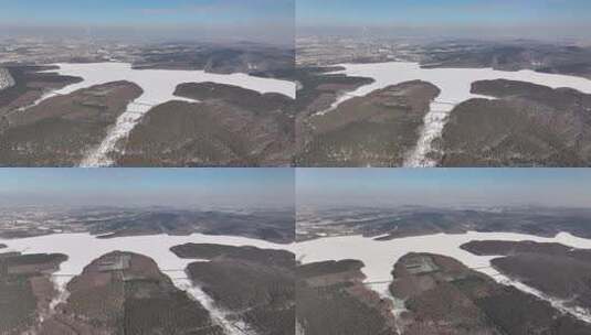 净月潭冬季结冰湖面航拍高清在线视频素材下载