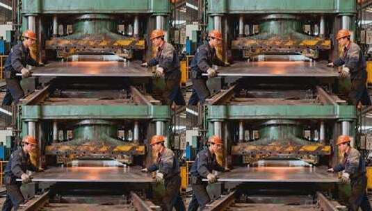 工人工厂操作重型冲压机械高清在线视频素材下载