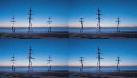 晨曦中矗立的高压输电塔高清在线视频素材下载