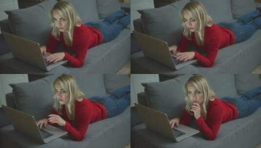 女人趴在沙发上玩电脑高清在线视频素材下载
