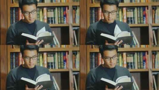 在图书馆阅读的男人高清在线视频素材下载