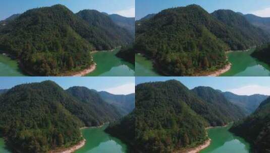 湖泊环绕的高山丛林高清在线视频素材下载