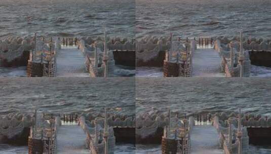 山东威海金海湾栈桥冰封景观海浪高清在线视频素材下载