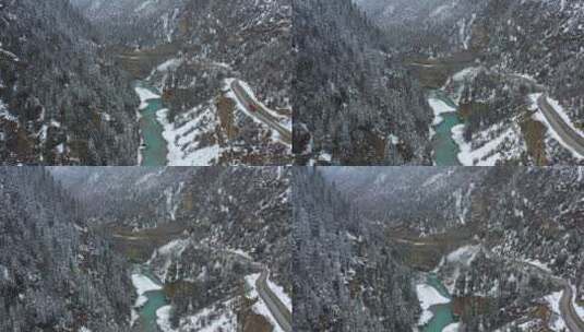 航拍大雪纷飞的帕隆藏布江河谷风光高清在线视频素材下载