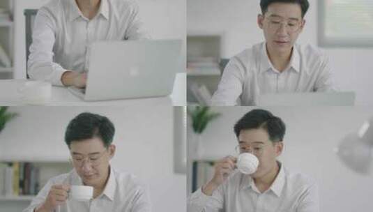 商务男士办公操作笔记本平板喝咖啡高清在线视频素材下载