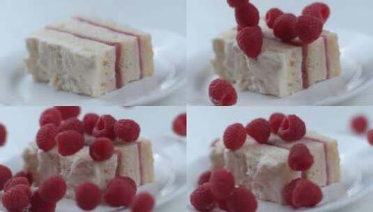 树莓落在盘子里的一块蛋糕上高清在线视频素材下载