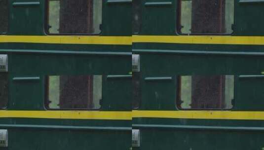 春天春雨下雨滴绿皮火车升格空镜高清在线视频素材下载