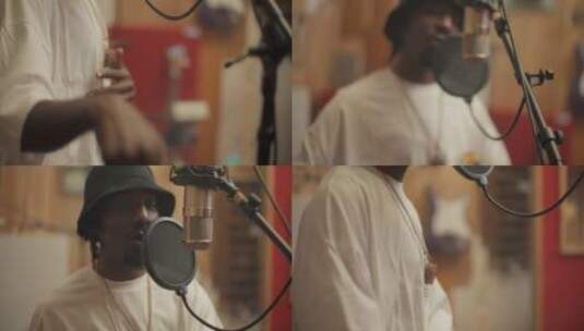 嘻哈歌手在录音棚录歌高清在线视频素材下载