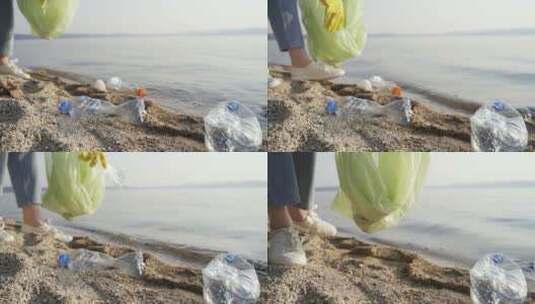 在海边沙滩做环保分拣清理垃圾的志愿者高清在线视频素材下载