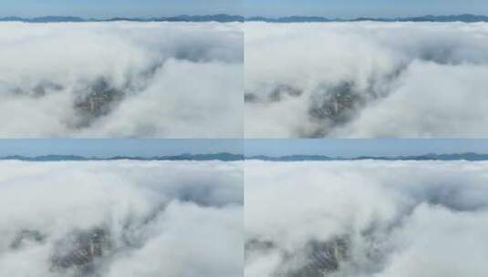 云海下的城市航拍穿云天际线晨雾视频素材高清在线视频素材下载