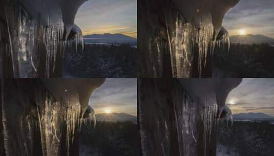 寒冷的冬季日出房屋冰锥冰挂高清在线视频素材下载