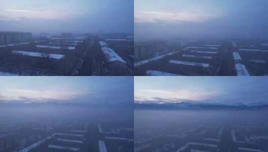 雾和烟雾中的城市黎明高清在线视频素材下载