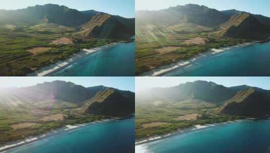 无人机拍摄显示夏威夷瓦胡岛日出时美丽的马库亚山谷和马库亚海滩。高清在线视频素材下载