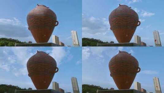 广场上矗立的彩陶罐、马家窑彩陶高清在线视频素材下载