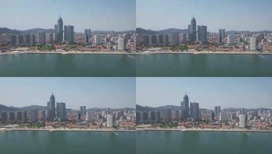 山东烟台海滨广场世贸大厦航拍高清在线视频素材下载