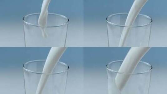 倒牛奶进杯子里高清在线视频素材下载