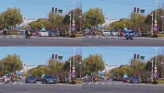 绿灯十字路口的车流高清在线视频素材下载