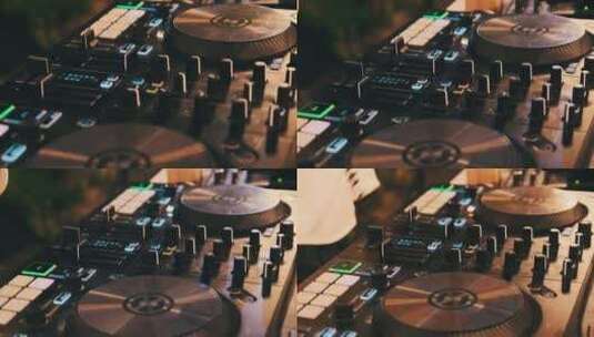 DJ在夜间派对上使用DJ混音控制器播放音高清在线视频素材下载