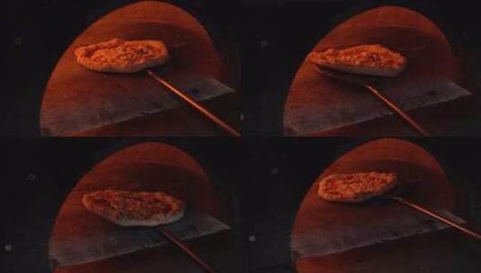 意大利披萨烤箱里烤披萨，周围有火，慢动作高清在线视频素材下载