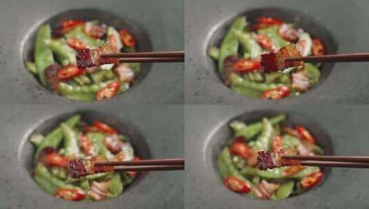 筷子夹起一片腊肉美食特写高清在线视频素材下载