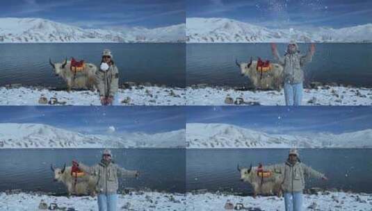 （慢镜）雪山湖泊蓝天白云美女玩雪撒雪高清在线视频素材下载