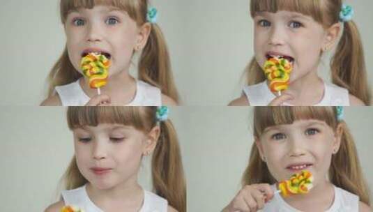 女孩吃棒棒糖高清在线视频素材下载
