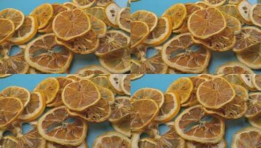 4K蓝底柠檬片柠檬干干柠檬水果高清在线视频素材下载