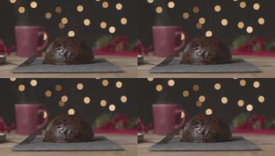 圣诞布丁和热咖啡杯的特写镜头高清在线视频素材下载