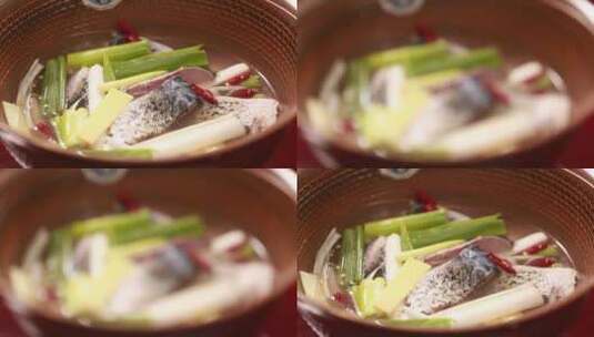 厨师用葱姜水腌制鱼块高清在线视频素材下载