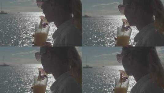女人在海边喝酒的唯美镜头高清在线视频素材下载