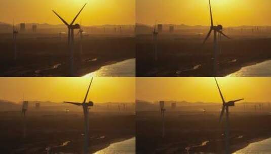 夕阳下风力发电风车航拍高清在线视频素材下载