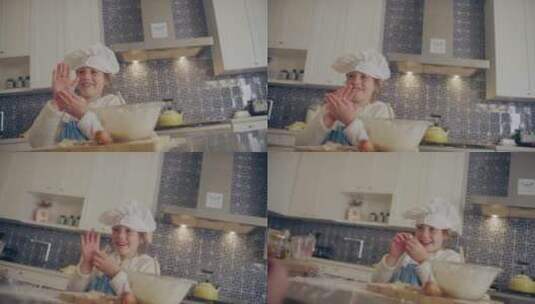 小女孩在厨房揉搓面团 高清在线视频素材下载