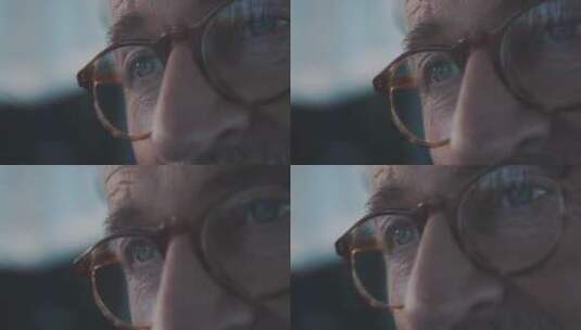 戴眼镜的老年男人特写镜头高清在线视频素材下载