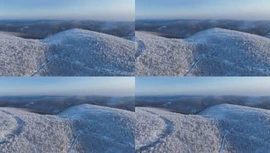 航拍逶迤山岭雪林雾凇高清在线视频素材下载