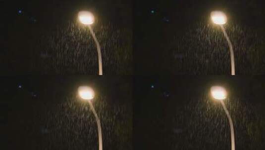 下雨天中路灯亮起雨夜晚景街道特写点亮孤独高清在线视频素材下载