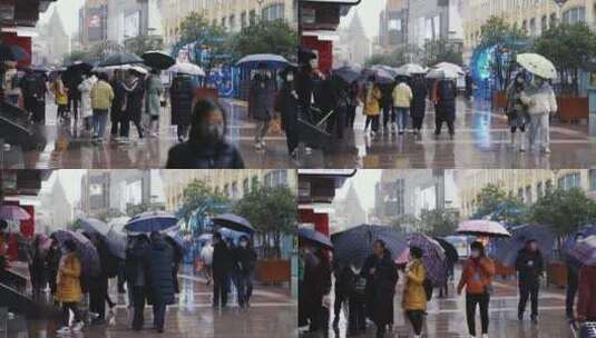 下雨天上海南京路行人撑伞走过拥挤繁忙倒影高清在线视频素材下载