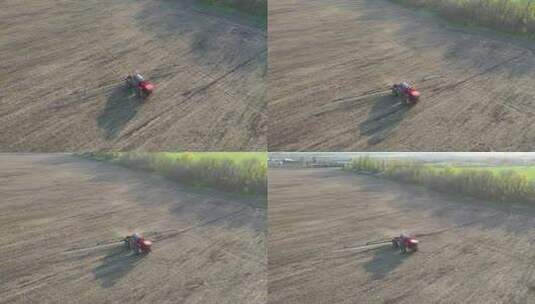 在工作日落时使用灌溉机的田野景观高清在线视频素材下载