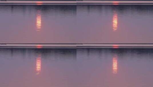 夕阳余辉湖水中倒影高清在线视频素材下载