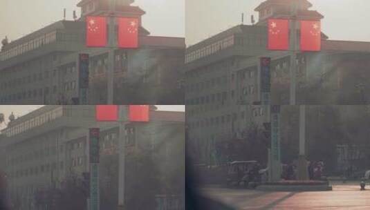 交通路口的五星红旗移动镜头高清在线视频素材下载